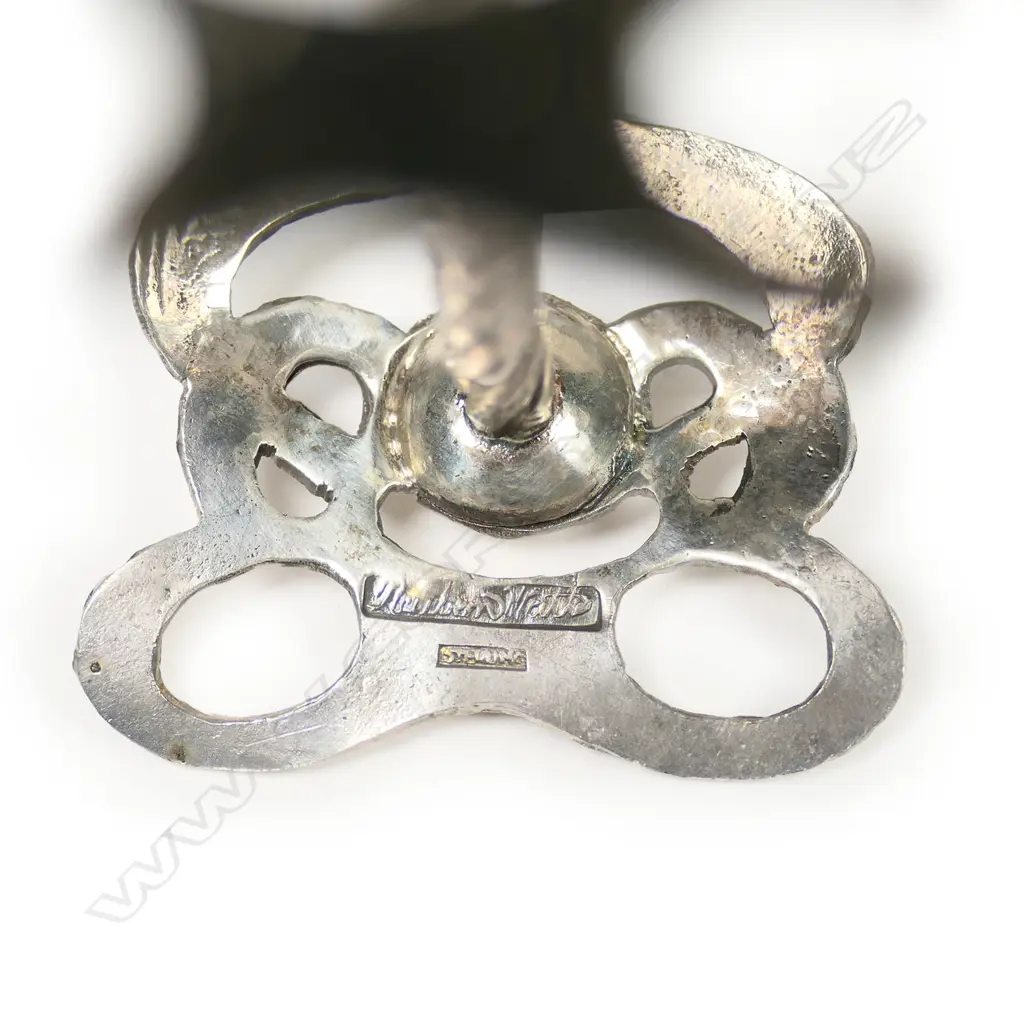 A pair of Reuben Watts N.Z. Arts & Crafts silver knife rests, Image 1++